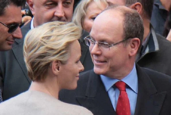 Prince Albert and Princess Charlene visited Palazzo Vecchio. Princess Charlene wore Elie Saab gold dress