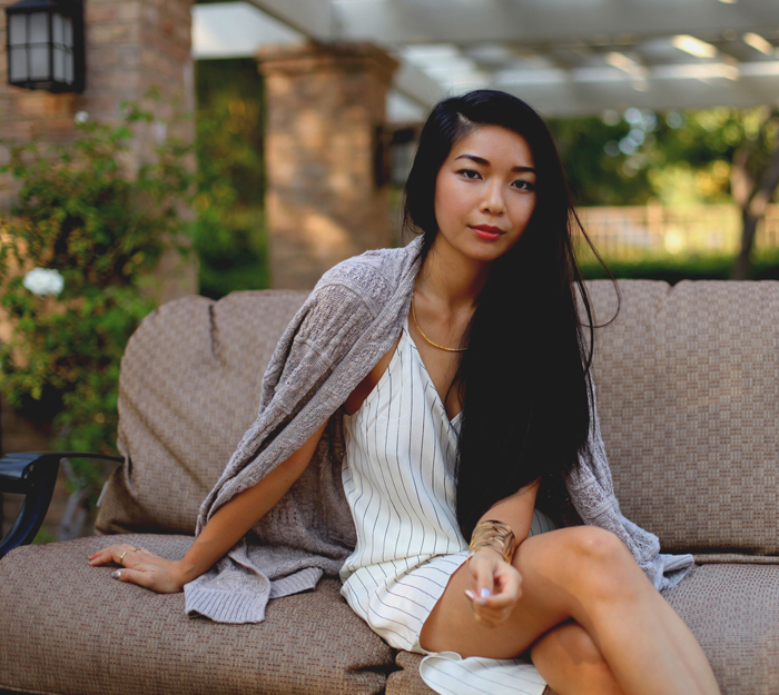Stephanie Liu of Honey & Silk wearing Urban Outfitters dress, Left on Houston sweater, and Gorjana taner collar necklace