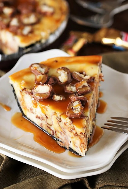 Twix Cheesecake Pie image - Love Twix candy bars?  Then you'll love them even more when they're surrounded by creamy cheesecake in this scrumptious Twix Cheesecake Pie.