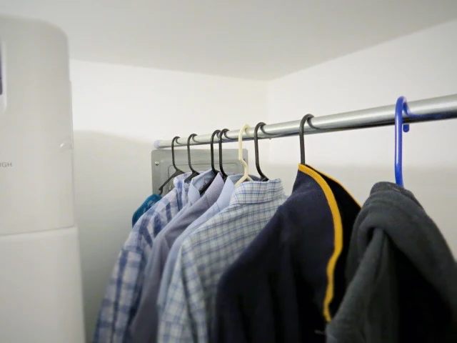 shower rod for drying clothes in laundry room before