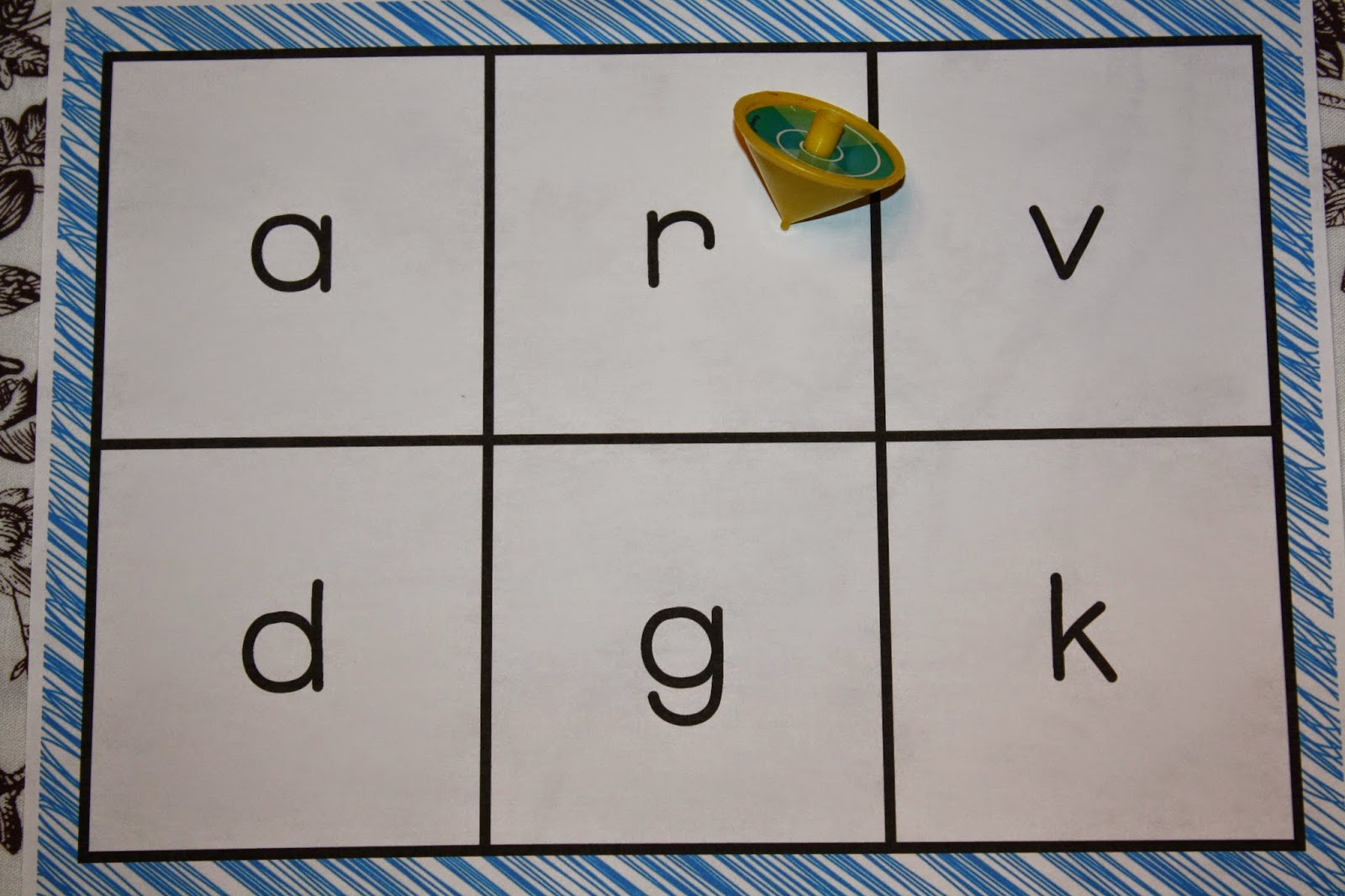 Spin a letter literacy activity center for Kindergarten