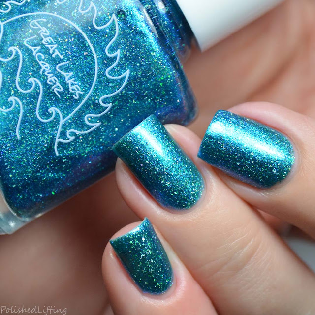 sapphire blue nail polish with holographic flecks