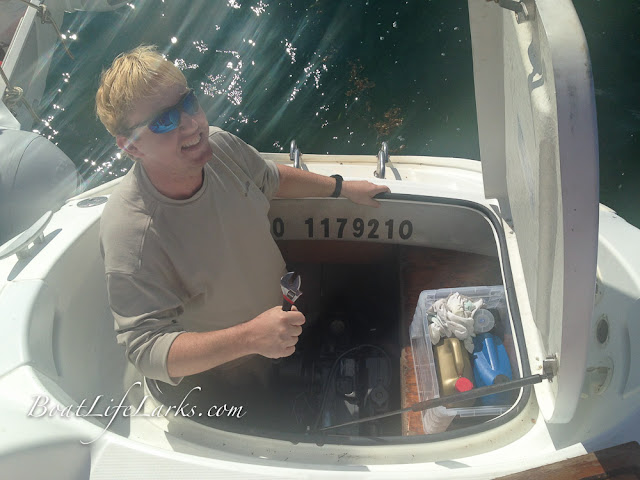 Working in the engine room on a Lagoon 380 sail catamaran
