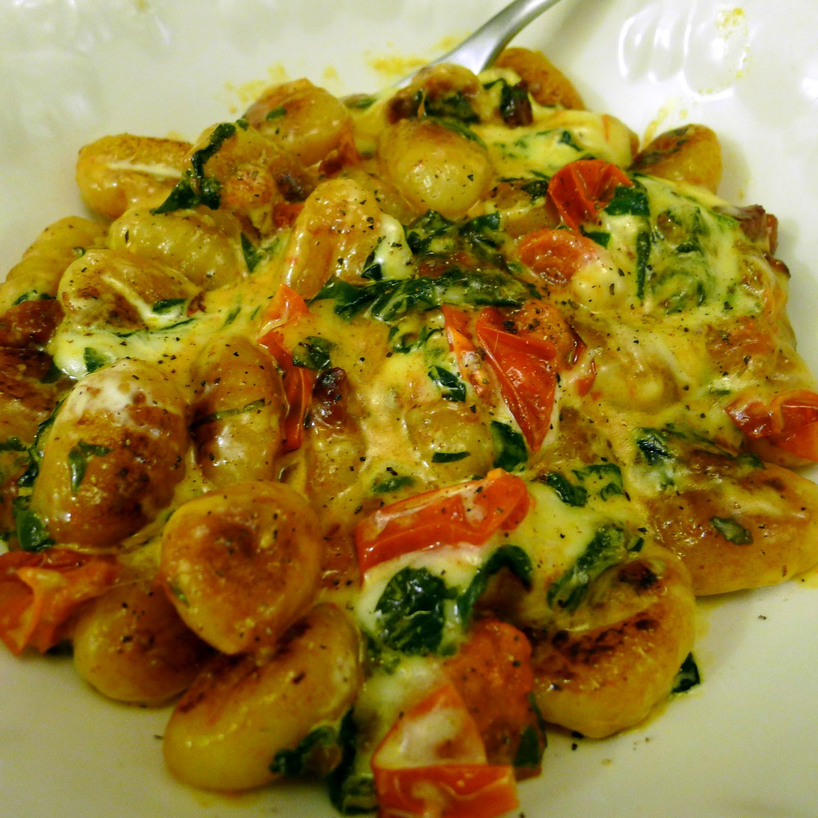 Culinary Adventures in London Fried Gnocchi with Pancetta, Spinach, Cherry Tomatoes and Mozzarella