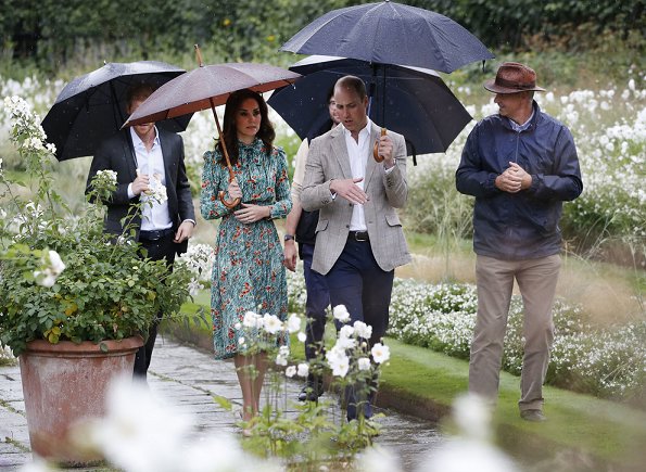 Kate Middleton wore Prada Printed silk dress, Monica Vinader Gold Vermeil Earrings and LK Bennett Fern pumps. Prince Harry