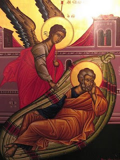 The angel appears to St. Joseph in a dream.