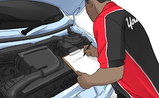 auto repairman with clipboard assessing the motor 