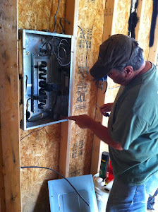 Tim working on the electrical box