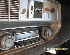 Original AM push-button radio sits in the dash of the 1967 F-85 Olds.