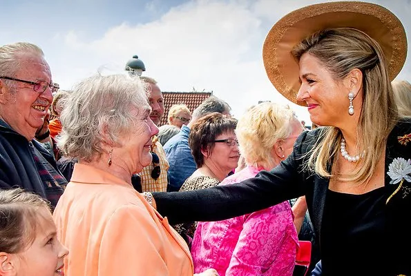 Queen Maxima wore Matthijs van Bergen Coppens Lelies jacket and floral print skirt