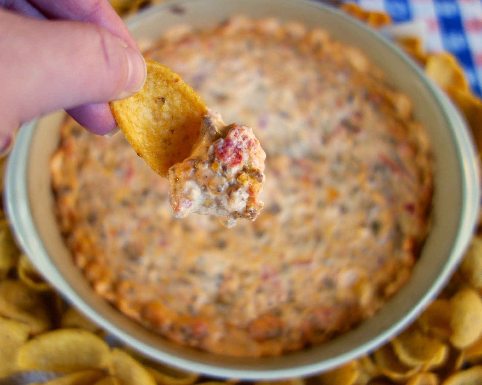 Hot Sausage Dip - always the star of our parties! Can make ahead and bake when ready. Seriously delicious!! Hot sausage, cream cheese, sour cream, cheddar cheese, diced tomatoes with green chiles. Serve with tortilla chips or corn chips. Everyone LOVES this yummy dip!! Hot Sausage Dip - always the star of our parties! Can make ahead and bake when ready. Seriously delicious!! Hot sausage, cream cheese, sour cream, cheddar cheese, diced tomatoes with green chiles. Serve with tortilla chips or corn chips. Everyone LOVES this yummy dip!!