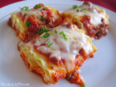 Lasagna Roll Ups are lasagna noodles filled three different cheeses and topped with a flavorful beef sauce. Life-in-the-Lofthouse.com