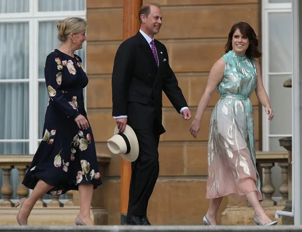 Princess Eugenie wore a silk dress by Peter Pilotto, the designer of her wedding dress. Countess of Wessex wore a floral print dress by Suzannah