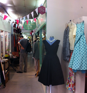 Vintage dresses in the corridor of Wood Street Market