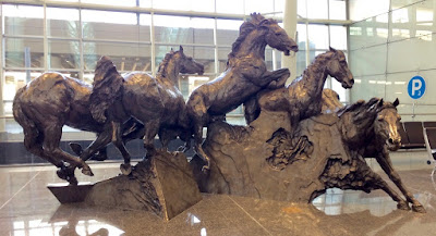 Calgary airport wild horses bronze statue Calgary airport wild horses bronze statue