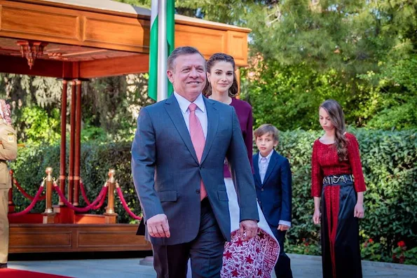 King Abdullah, Queen Rania, Crown Prince Al Hussein, Princess Salma, Prince Hashem attend a ceremony held in Amman for kingdom's 70th Independence Day. Queen Rania dress style, fashions, Valentino dress, Gant dress