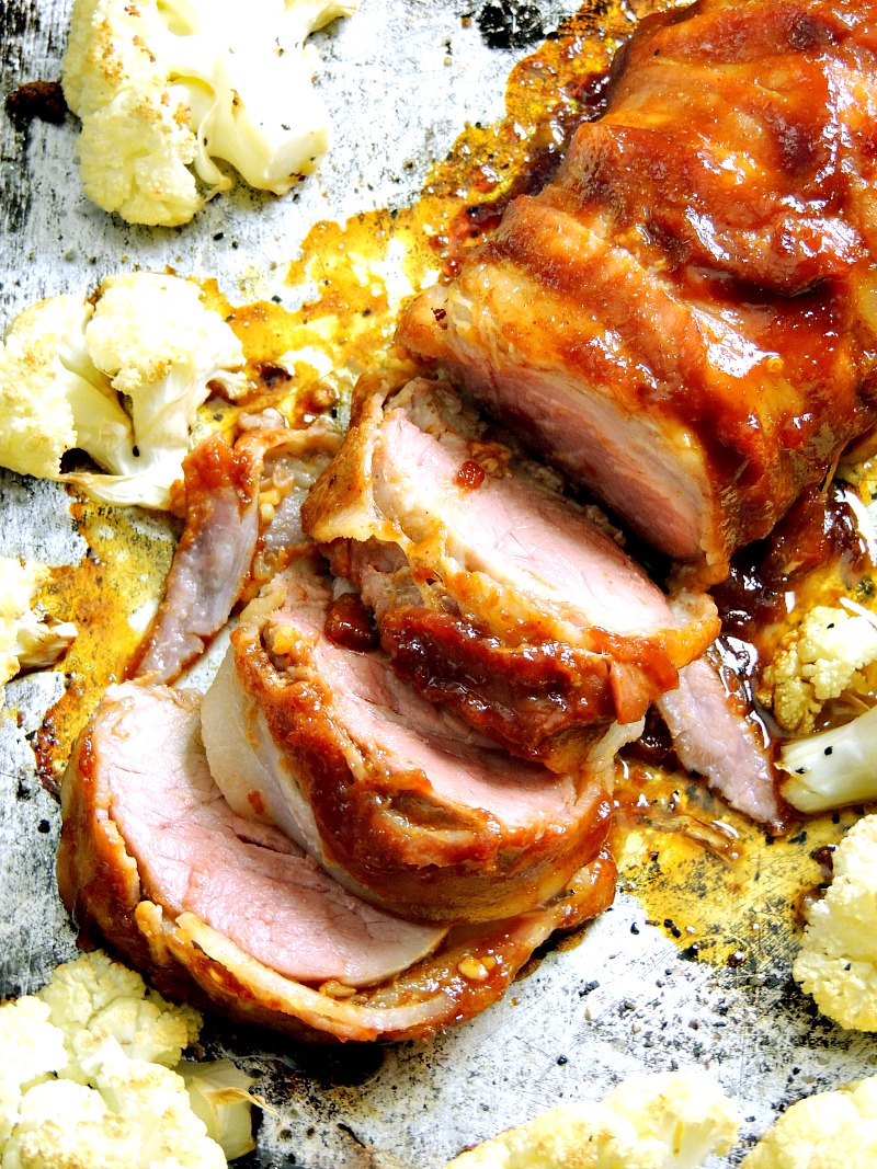 This Keto Sheet Pan Bacon Wrapped BBQ Pork Tenderloin recipe is the easiest way to get that BBQ flavor without having to light the grill, this sheet pan meal is so easy and perfect for a busy weeknight meal. #keto #lowcarb #lchf #sheetpan #pork #tenderloin #bacon #easy #recipe #glutenfree #kidfriendly | bobbiskozykitchen.com