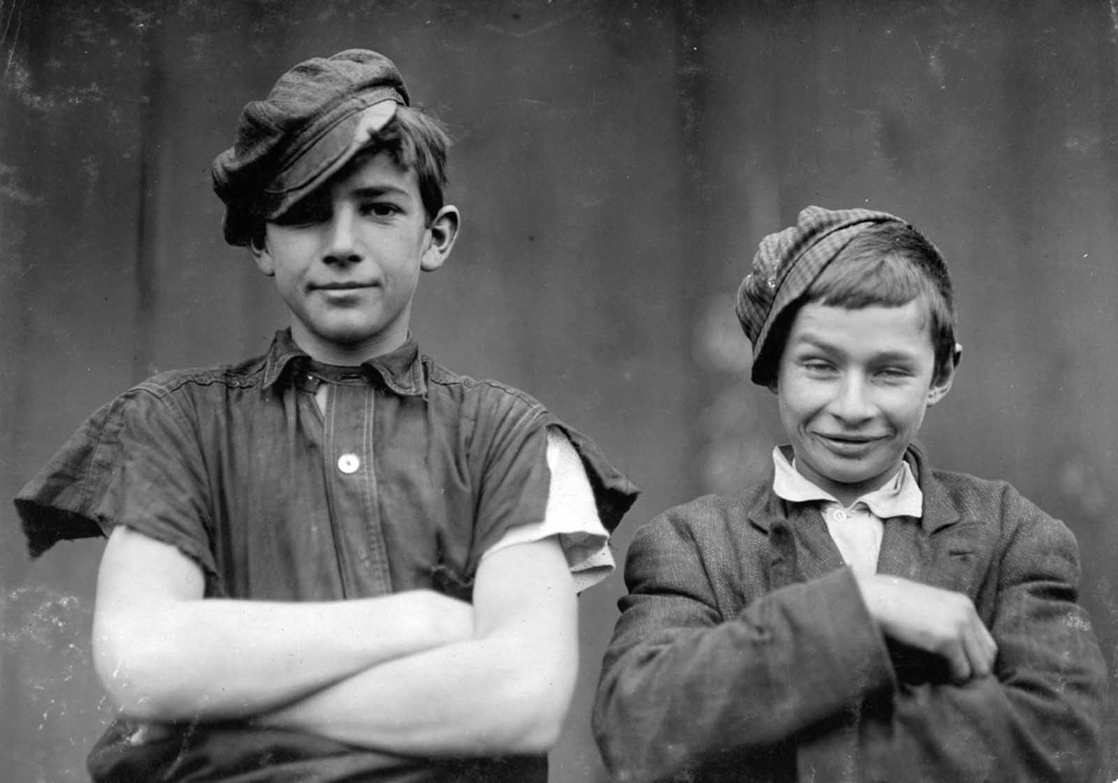 Two of the boys on night shift in the More-Jones Glass Co., in Bridgeton, New Jersey, in November of 1909. 