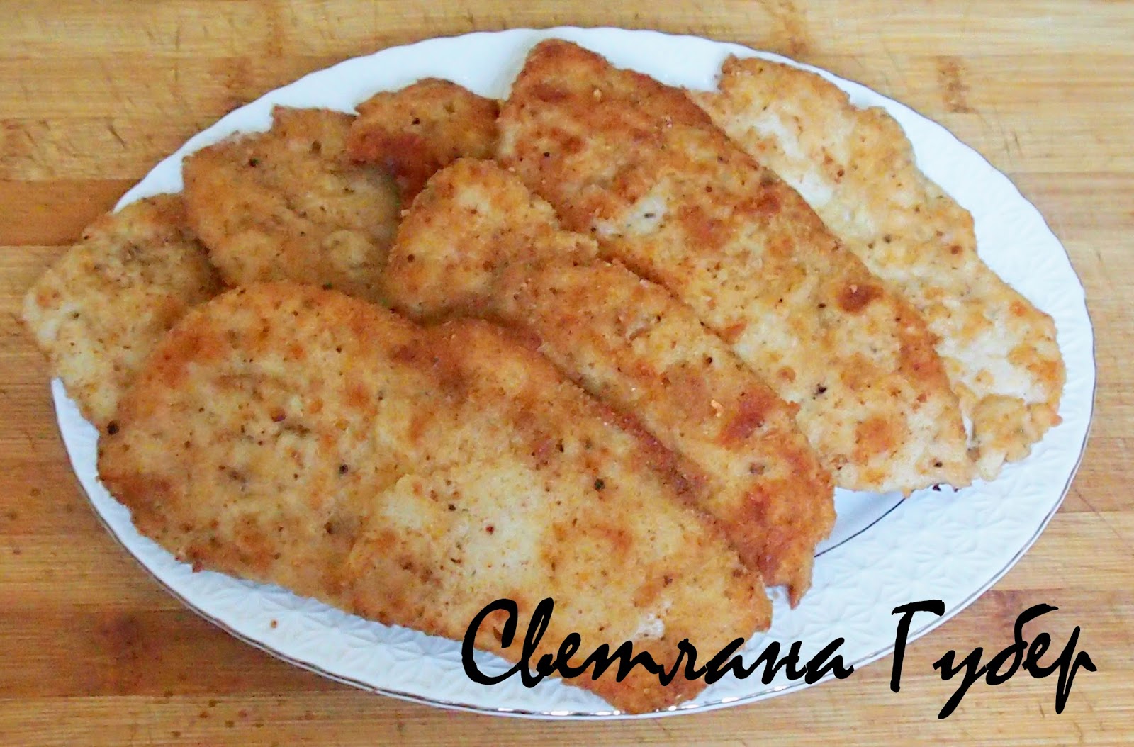 филе куриной грудки в панировке. курица в панировке на сковороде. куриные грудки в панировке. филе в сухарях на сковороде. жареная курица в панировке.