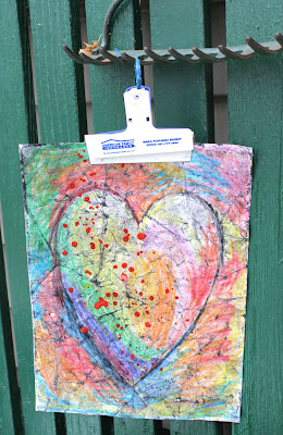 paper batik instruction drawing of a multi colored heart
