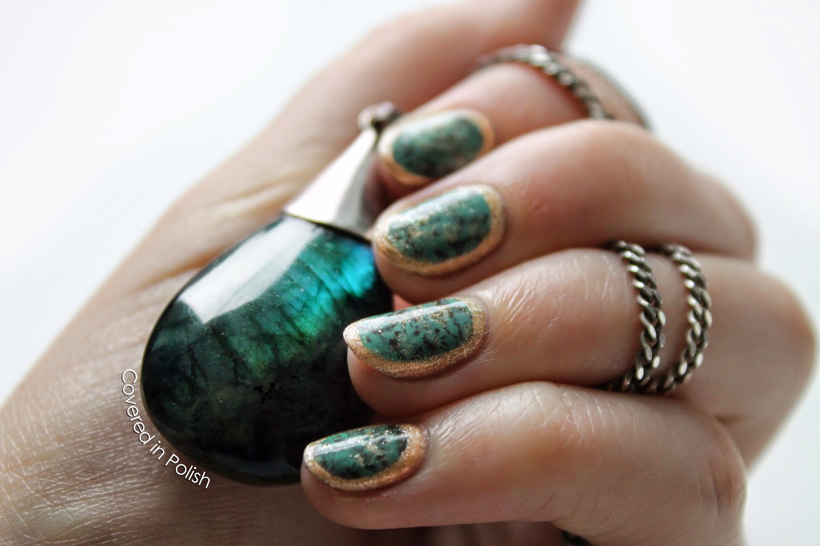 Covered in Polish Labradorite inspired nails