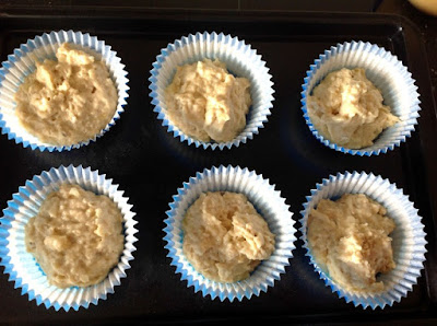 6 muffin cases with mixture inside