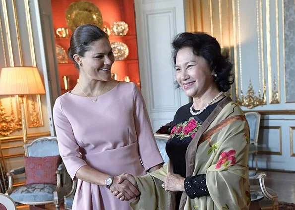 The fold London Camelot dress. Crown Princess Victoria of Sweden met with the Chairwoman of Vietnam's National Assembly Nguyen Thi Kim Ngan at the Royal Palace.