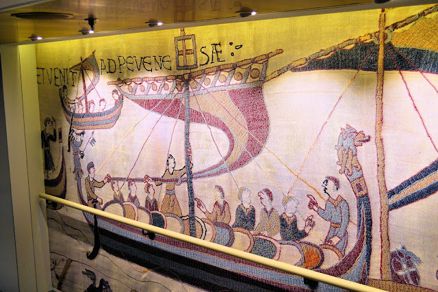 Along the back walls of the stairways from the top deck to the bottom, you can retrace the Norman conquest of England in these reproductions of the Bayeux Tapestry.