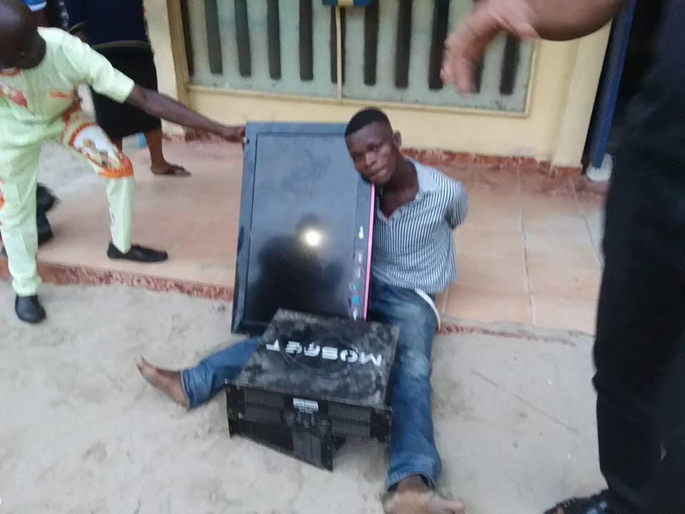 Burglar apprehended after trying to run away with Plasma TV, other