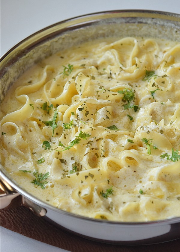 Closer look of Fettuccine Alfredo with grated Parmesan