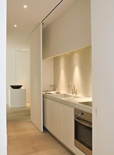 Armarios que esconden una cocina