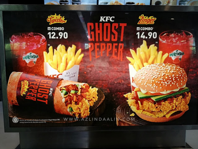 PEDAS SANGAT KE KFC GHOST PEPPER? - KFC sekarang ni, rajin keluarkan menu baru kan. As usual, kalau ada menu baru je di KFC..mummy akan terjah jugak lah. Nak jugaklah merasa kan menu baru. Biasanya menu baru ini limited time je ! Berbalik kisah menu baru di KFC iaitu KFC GHOST PEPPER. Bila nampak KFC GHOST PEPPER ni, pada awalnya rasa serba salah sangat-sangat nak cuba. Takut pedas tak ingat je. Mummy memang jenis tahan pedas, setakat cili api buat ulam tu.. apa lah sangat kan hehehe. PEDAS SANGAT KE KFC GHOST PEPPER? PEDAS SANGAT KE KFC GHOST PEPPER? Mummy risau pedas dia melampau tahap maksimum. Ye lah kan, kang kalau pedas sangat macam samyang tu kang membazir pulak. Hat tu, memang tak boleh nak tahan ! Kami laki bini memberanikan diri untuk mencuba KFC GHOST PEPPER? Jeng jeng jengggggg . Mummy memilih KFC GHOST PEPPER TWISTER manakala, daddy pulak memilih ZInger ! Bungkusan luar KFC GHOST PEPPER. Sama macam wrap biasa KFC Twister, corak je lain ! Gerun tak nampak wrap warna pink merah tu ha? Hehehe memula gerun jugak, ingatkan kulit wrap tu pedas jugak ! Rupanya warna je merah pink, jangan risau kulit tu ha tak pedas tau ! Pedas ke KFC GHOST PEPPER hehehe. Eh isi Twister dalamnya tak sama dalam gambar, isi nya tak sampai atas pun hehehe. Walau nampak macam tak sampai atas isinya, tapi isi dalamnya padat. Ada isi ayam (spicy), sayuran dan sos smokey BBQ (lebih kurang) sos inilah macam pedas. Tapi, bukan pedas berapi sangat pun. Masih okaylah pedasnya. Boleh tahan lagi. HARGA KFC GHOST PEPPER? Harga untuk KFC GHOST PEPPER ialah RM12.90 untuk twister . Manakala KFC GHOST PEPPER Zinger pula RM14.90. Jom cuba KFC GHOST PEPPER , sebab ianya limited time je tau ! PEDAS SANGAT KE KFC GHOST PEPPER? - KFC sekarang ni, rajin keluarkan menu baru kan. As usual, kalau ada menu baru je di KFC..mummy akan terjah jugak lah. Nak jugaklah merasa kan menu baru. Biasanya menu baru ini limited time je ! Berbalik kisah menu baru di KFC iaitu KFC GHOST PEPPER. Bila nampak KFC GHOST PEPPER ni, pada awalnya rasa serba salah sangat-sangat nak cuba. Takut pedas tak ingat je. Mummy memang jenis tahan pedas, setakat cili api buat ulam tu.. apa lah sangat kan hehehe. PEDAS SANGAT KE KFC GHOST PEPPER? PEDAS SANGAT KE KFC GHOST PEPPER? Mummy risau pedas dia melampau tahap maksimum. Ye lah kan, kang kalau pedas sangat macam samyang tu kang membazir pulak. Hat tu, memang tak boleh nak tahan ! Kami laki bini memberanikan diri untuk mencuba KFC GHOST PEPPER? Jeng jeng jengggggg . Mummy memilih KFC GHOST PEPPER TWISTER manakala, daddy pulak memilih ZInger ! Bungkusan luar KFC GHOST PEPPER. Sama macam wrap biasa KFC Twister, corak je lain ! Gerun tak nampak wrap warna pink merah tu ha? Hehehe memula gerun jugak, ingatkan kulit wrap tu pedas jugak ! Rupanya warna je merah pink, jangan risau kulit tu ha tak pedas tau ! Pedas ke KFC GHOST PEPPER hehehe. Eh isi Twister dalamnya tak sama dalam gambar, isi nya tak sampai atas pun hehehe. Walau nampak macam tak sampai atas isinya, tapi isi dalamnya padat. Ada isi ayam (spicy), sayuran dan sos smokey BBQ (lebih kurang) sos inilah macam pedas. Tapi, bukan pedas berapi sangat pun. Masih okaylah pedasnya. Boleh tahan lagi. HARGA KFC GHOST PEPPER? Harga untuk KFC GHOST PEPPER ialah RM12.90 untuk twister . Manakala KFC GHOST PEPPER Zinger pula RM14.90. Jom cuba KFC GHOST PEPPER , sebab ianya limited time je tau !