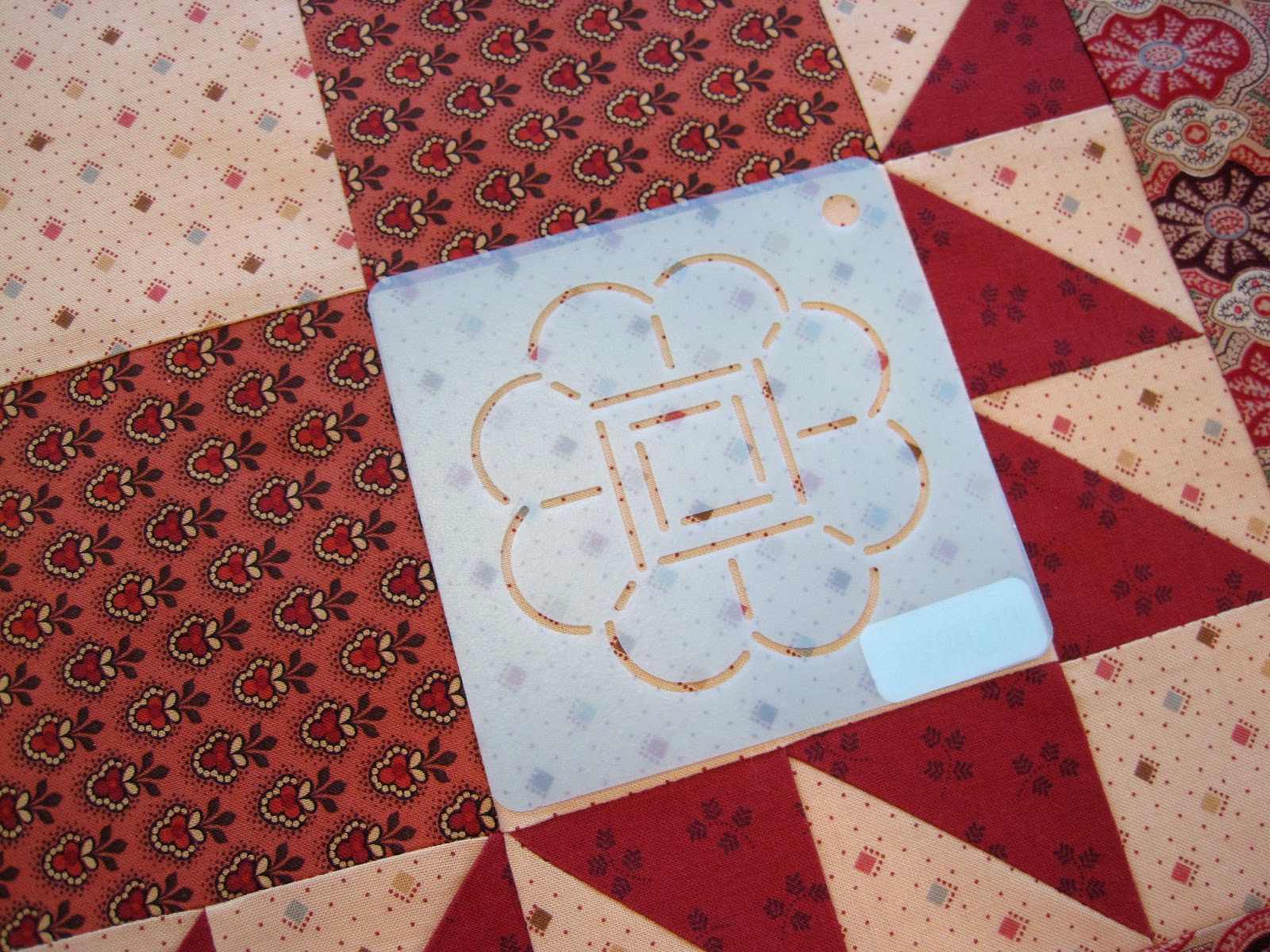 A Sentimental Quilter Quilting with Stencils