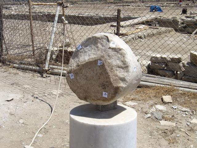 Laser measurements on marble pillar piece to aid in restoration
