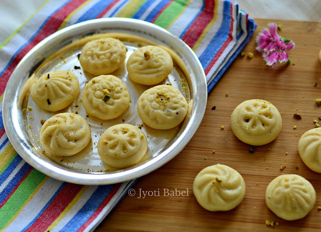 Instant Peda Recipe | Peda is rich milk fudge make from khoya and flavoured with cardamom or saffron. In this instant peda recipe, we will make it with milk powder and condensed milk. www.jyotibabel.com