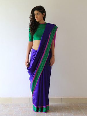 The handwoven silk saree with simple blouse design portrays elegance and grace.