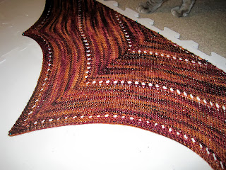 http://www.ravelry.com/projects/morninglorie/the-age-of-brass-and-steam-kerchief