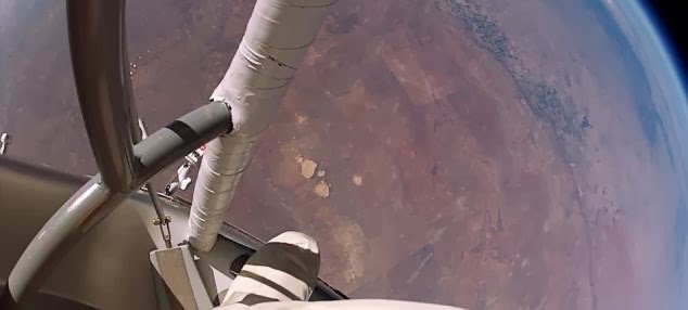 A helmet mounted camera looking down from the capsule - What it’s REALLY like to jump from space - New footage of Felix Baumgartner's jump A helmet mounted camera looking down from the capsule - What it’s REALLY like to jump from space - New footage of Felix Baumgartner's jump