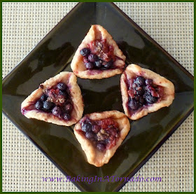 Chocolate Berry Cream Cheese Hamentashen | www.BakingInATornado.com | #recipe #cookies