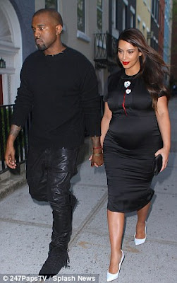 Kim K auctions off her maternity clothes on e-bay (photos)