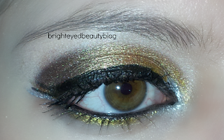 New Year's Eve mixed metals graphic eyeliner eye look