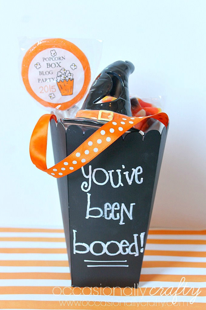 Turn a plain popcorn box into a fun Halloween treat holder!  Boo your neighbors with this "You've Been Booed" Chalkboard Gift Basket!
