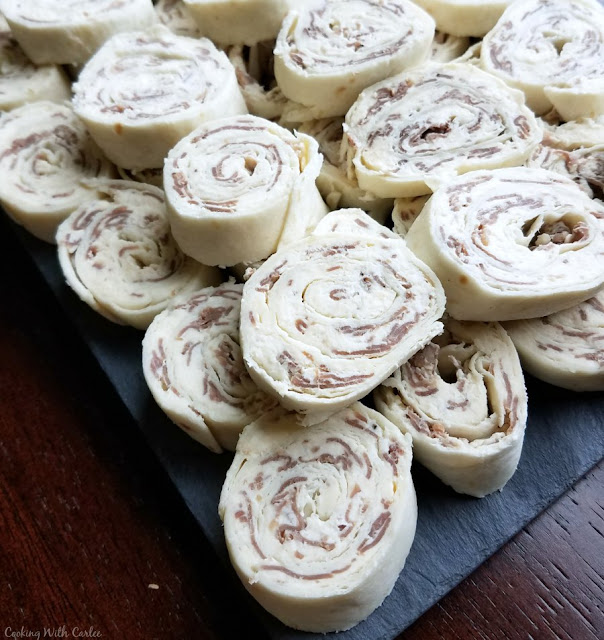 Perfectly easy finger food that is made to be snacked on, these 4 ingredient roast beef pinwheels are a great party starter!