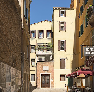 Canaletto's house, marked with the plaque above the brown doors, was in an obscure backstreet near the Rialto