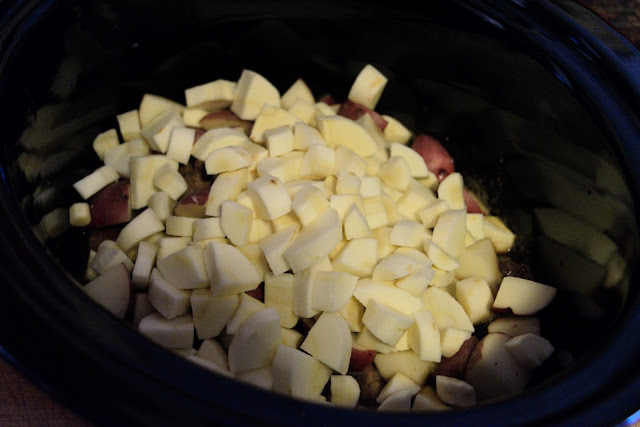 Parsnips being added to the crock pot. 