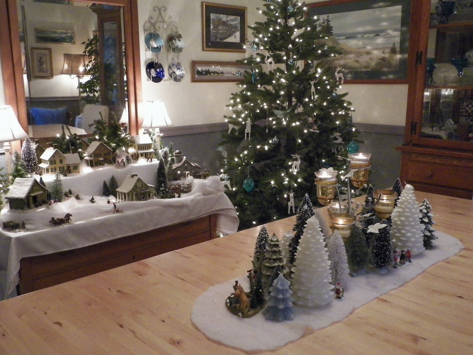 scene on the table is part of our home's Christmas village scene ...