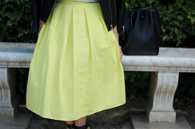 An outfit post featuring a 424 Fifth citron midi skirt, a stripe Forever 21 shirt and a Mansur Gavriel bucket bag shot at the Palace of Versailles by Vancouver fashion blogger Aleesha Harris of Covet and Acquire.