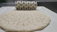Pizza base with roller pin for  pizza base recipe