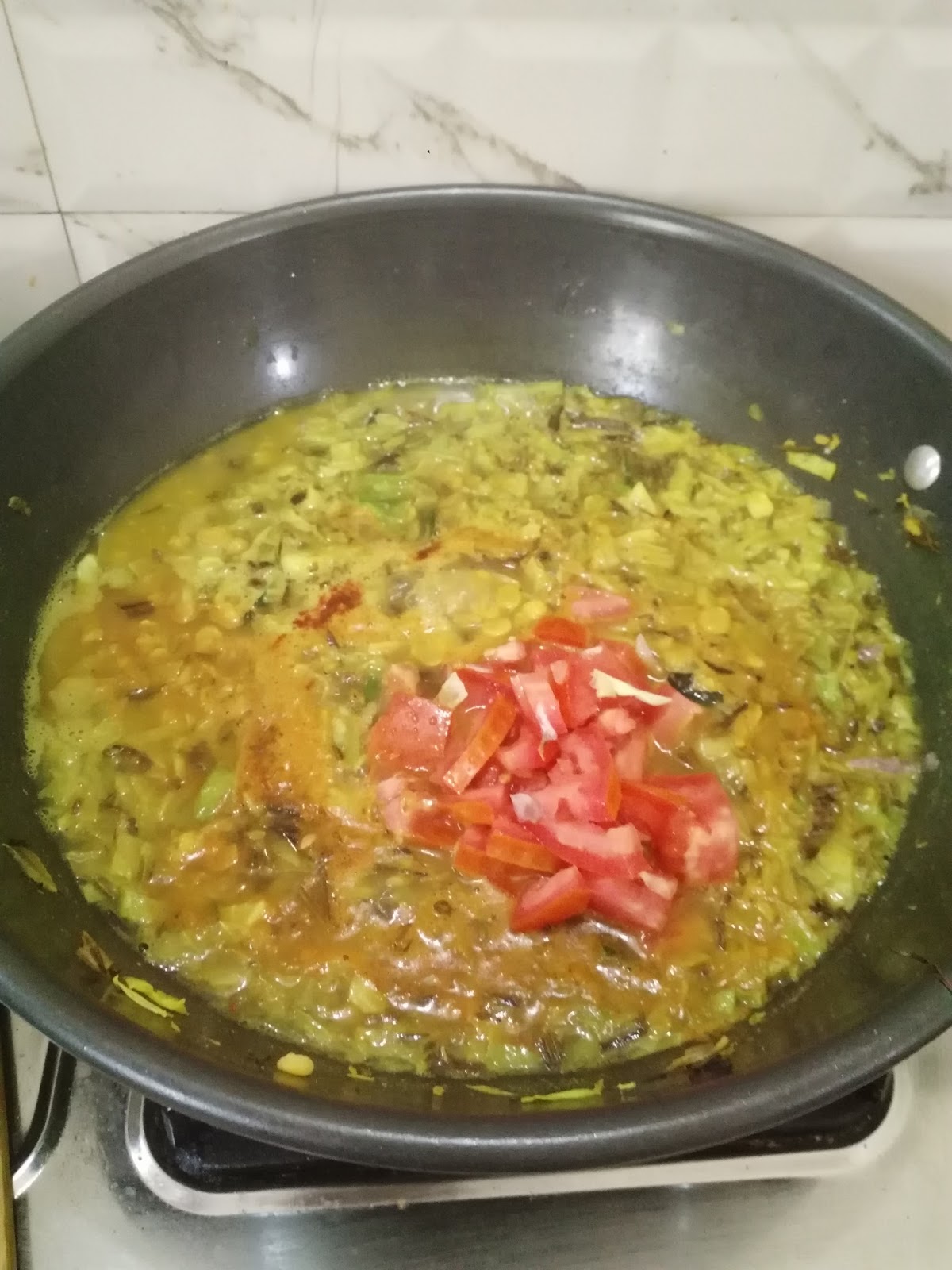 Mix well then add tumeric powder,chilly powder,,cooked channa dhaal