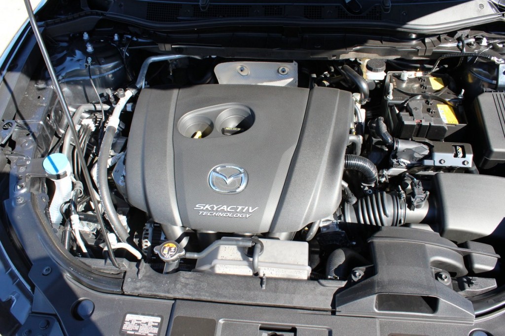 Двигатель мазда сх5 2.5. Мазда СХ-5 мотор. Mazda CX-5 двигатель 2.0. Двигатель Мазда СХ 5.